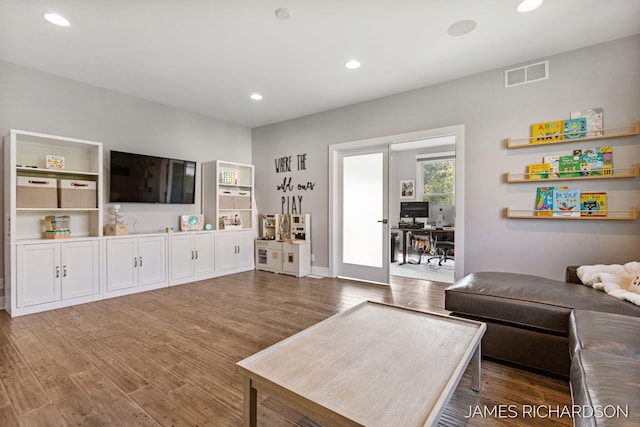 12974 Boulderway Trl, Grand Haven, MI 49417 - living area with wood finished floors and recessed lighting