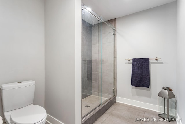 12974 Boulderway Trl, Grand Haven, MI 49417 - bathroom featuring a stall shower and tile patterned flooring