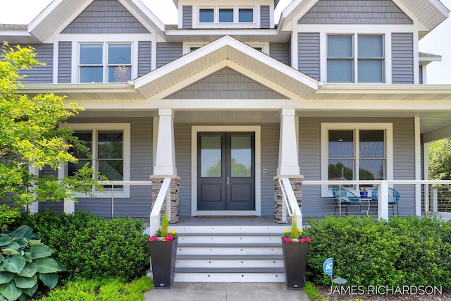 12974 Boulderway Trl, Grand Haven, MI 49417 - property entrance with a porch