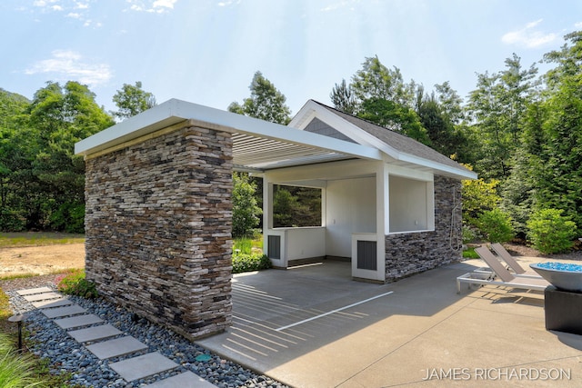 12974 Boulderway Trl, Grand Haven, MI 49417 - view of home's community with a patio