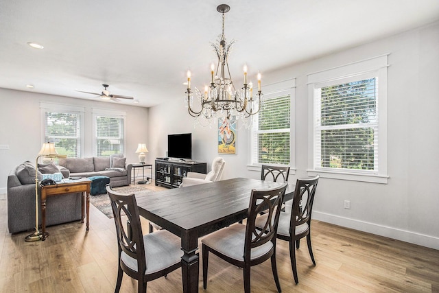 765 S Haven Pl, South Haven, MI 49090 - dining space featuring light wood-style floors, a ceiling fan, a chandelier, and recessed lighting