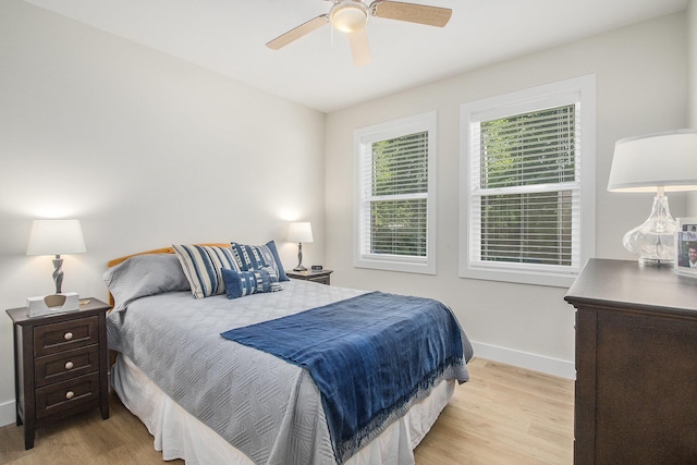 765 S Haven Pl, South Haven, MI 49090 - bedroom with light wood-style floors and a ceiling fan
