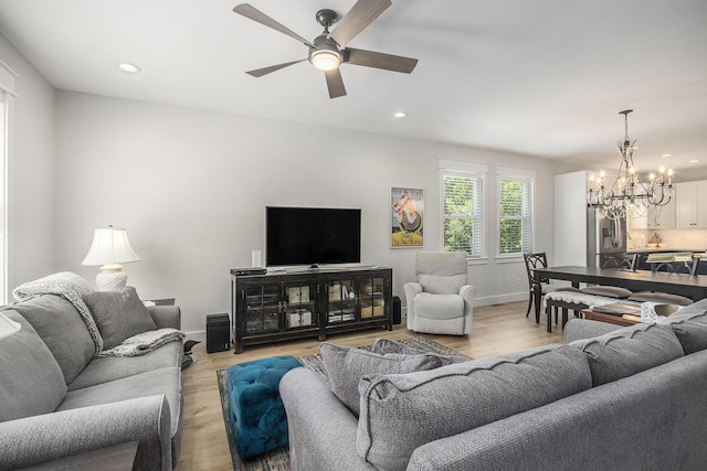 765 S Haven Pl, South Haven, MI 49090 - living room featuring a chandelier, ceiling fan, recessed lighting, and light wood-type flooring