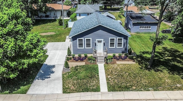 765 S Haven Pl, South Haven, MI 49090 - view of front of property featuring a front lawn and roof with shingles