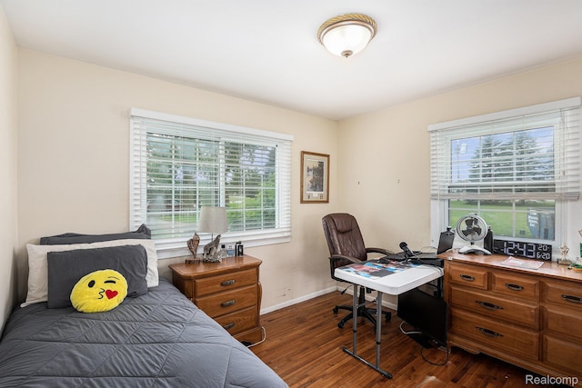 11508 Grand Blanc Rd, Gaines, MI 48436 - bedroom featuring dark wood-style floors and an office area