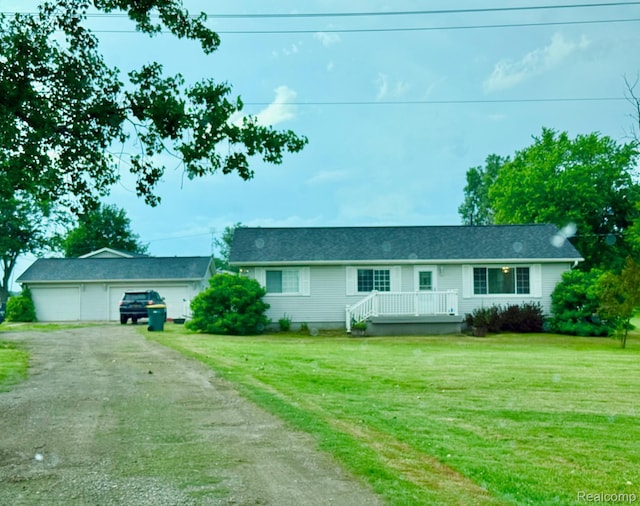 11508 Grand Blanc Rd, Gaines, MI 48436 - ranch-style house featuring driveway and a front lawn