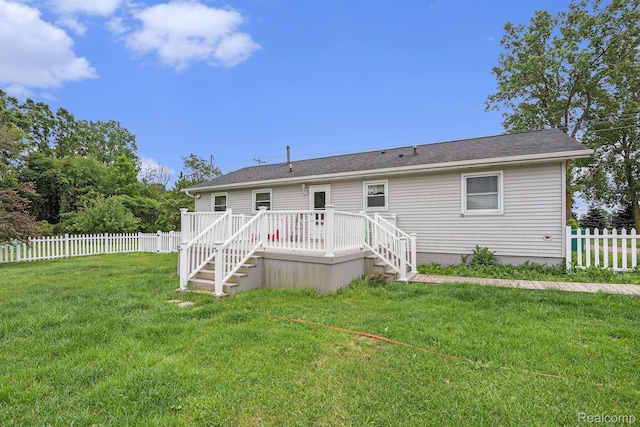 11508 Grand Blanc Rd, Gaines, MI 48436 - rear view of property featuring a deck, stairs, and roof with shingles