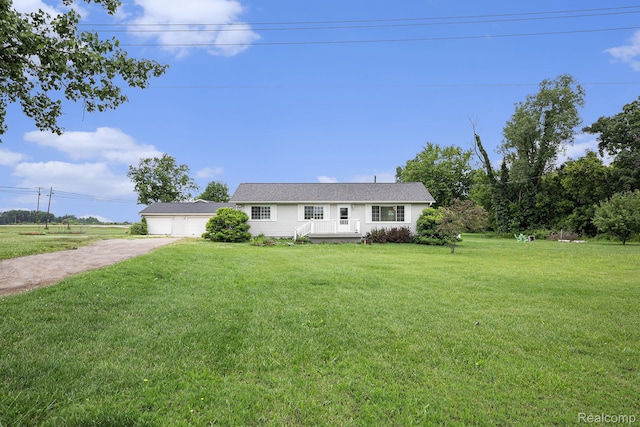 11508 Grand Blanc Rd, Gaines, MI 48436 - ranch-style house featuring driveway and a front yard