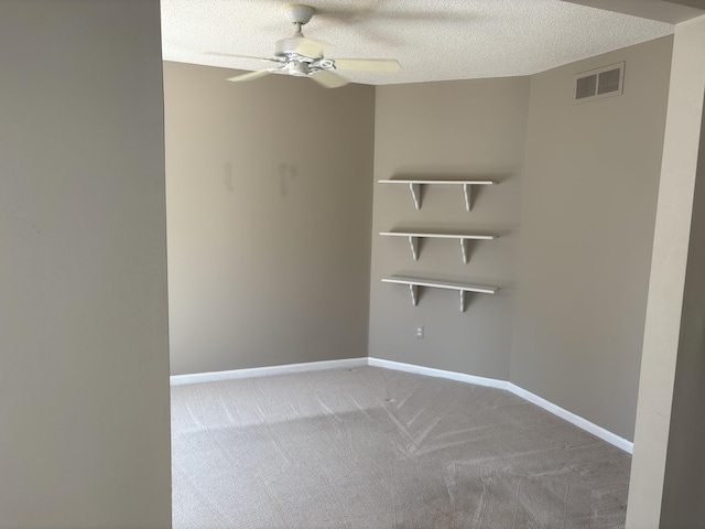 35595 Lone Pine Ln, Farmington Hills, MI 48335 - spare room with a ceiling fan, carpet, and a textured ceiling