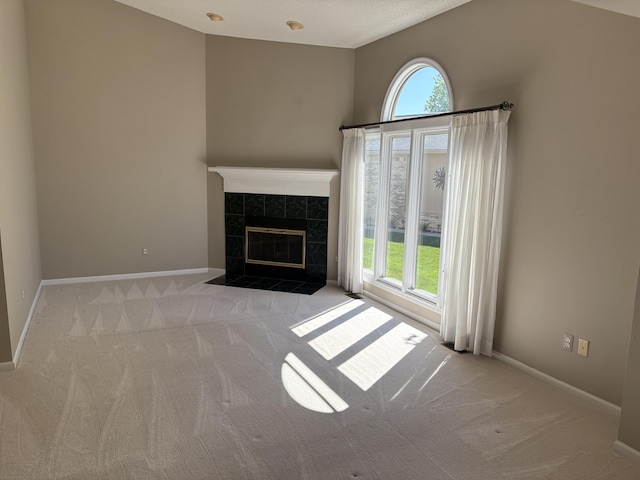 35595 Lone Pine Ln, Farmington Hills, MI 48335 - unfurnished living room featuring carpet flooring and a tile fireplace