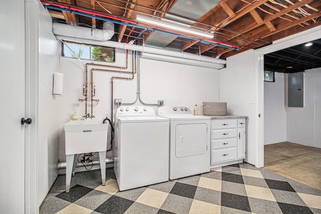 5145 Hensley Dr, Ann Arbor, MI 48103 - laundry area with washing machine and clothes dryer, light flooring, and electric panel