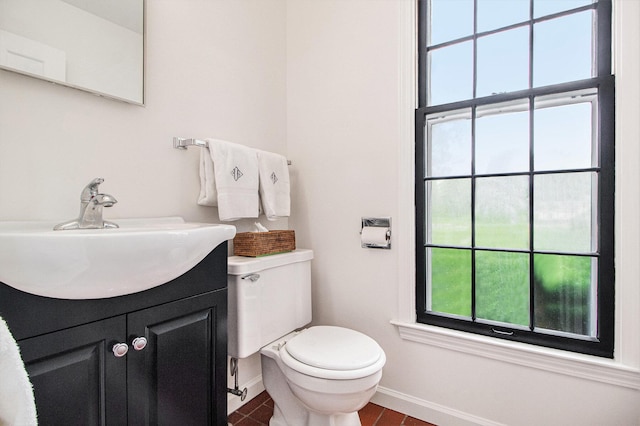 5145 Hensley Dr, Ann Arbor, MI 48103 - half bathroom with plenty of natural light, vanity, and tile patterned flooring