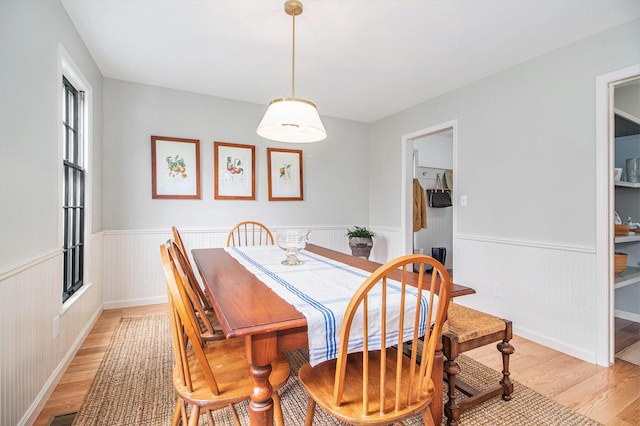 5145 Hensley Dr, Ann Arbor, MI 48103 - dining space with light wood-style floors and wainscoting
