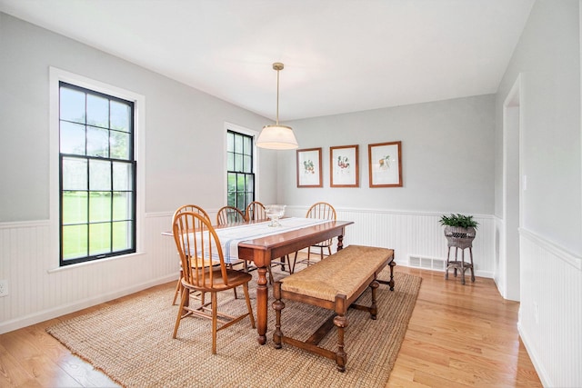 5145 Hensley Dr, Ann Arbor, MI 48103 - dining space featuring wainscoting and light wood-style flooring