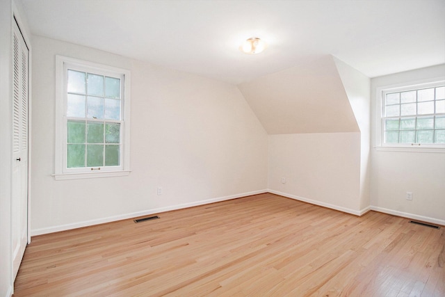 5145 Hensley Dr, Ann Arbor, MI 48103 - bonus room featuring light wood finished floors and vaulted ceiling