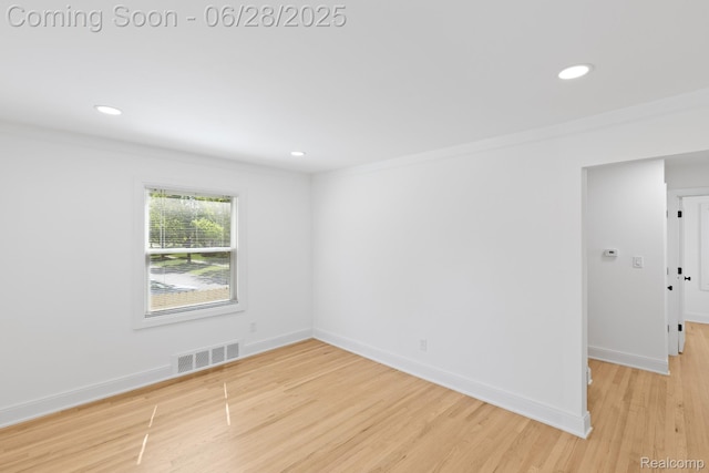 1590 Chapin Ave, Birmingham, MI 48009 - empty room featuring light wood-style floors, recessed lighting, and ornamental molding