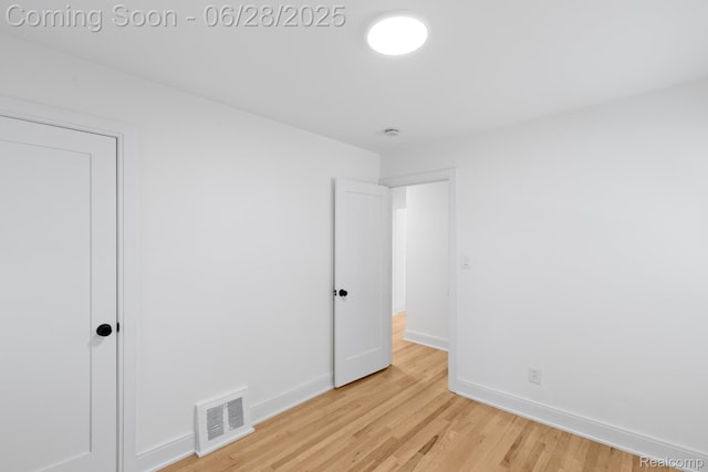 1590 Chapin Ave, Birmingham, MI 48009 - unfurnished bedroom featuring light wood-style floors and baseboards