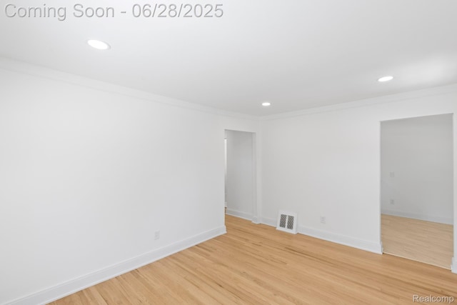 1590 Chapin Ave, Birmingham, MI 48009 - spare room with recessed lighting, light wood-style floors, and crown molding