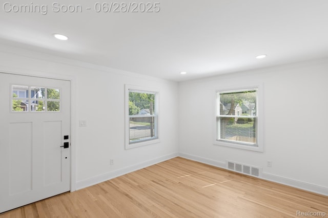 1590 Chapin Ave, Birmingham, MI 48009 - entrance foyer with light wood-style flooring and recessed lighting