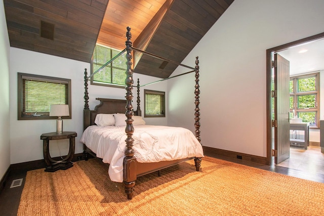 7085 Youngren Rd, Three Oaks, MI 49128 - bedroom with lofted ceiling, wooden ceiling, and wood finished floors