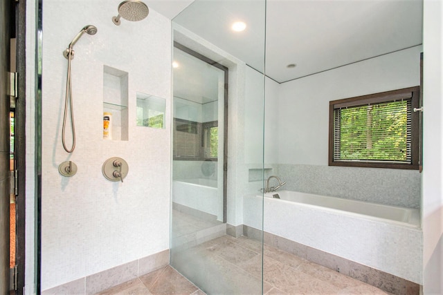 7085 Youngren Rd, Three Oaks, MI 49128 - bathroom with a shower with shower door, a bath, and tile patterned flooring