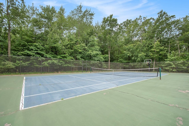 7085 Youngren Rd, Three Oaks, MI 49128 - view of tennis court featuring community basketball court and a forest view