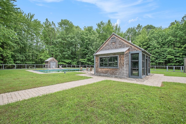 7085 Youngren Rd, Three Oaks, MI 49128 - fenced backyard with an outdoor structure