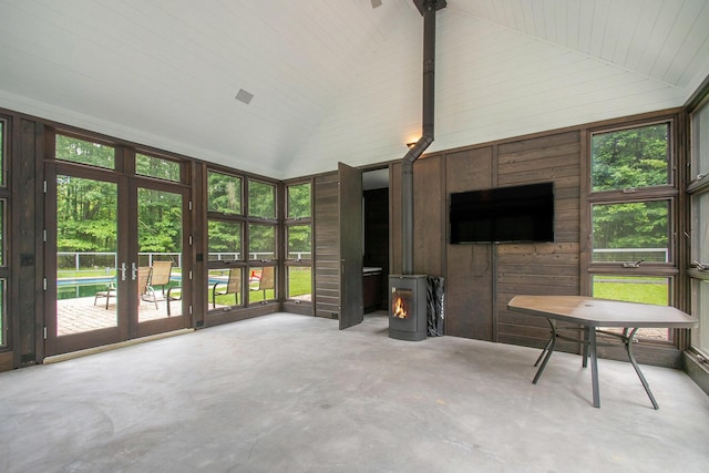 7085 Youngren Rd, Three Oaks, MI 49128 - sunroom with french doors, vaulted ceiling, and a wood stove