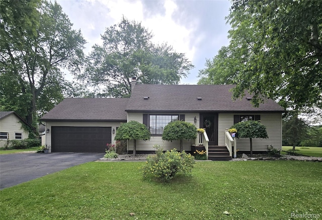 11019 Washington Ave, Mount Morris, MI 48458 - single story home featuring asphalt driveway, an attached garage, a front yard, and a chimney