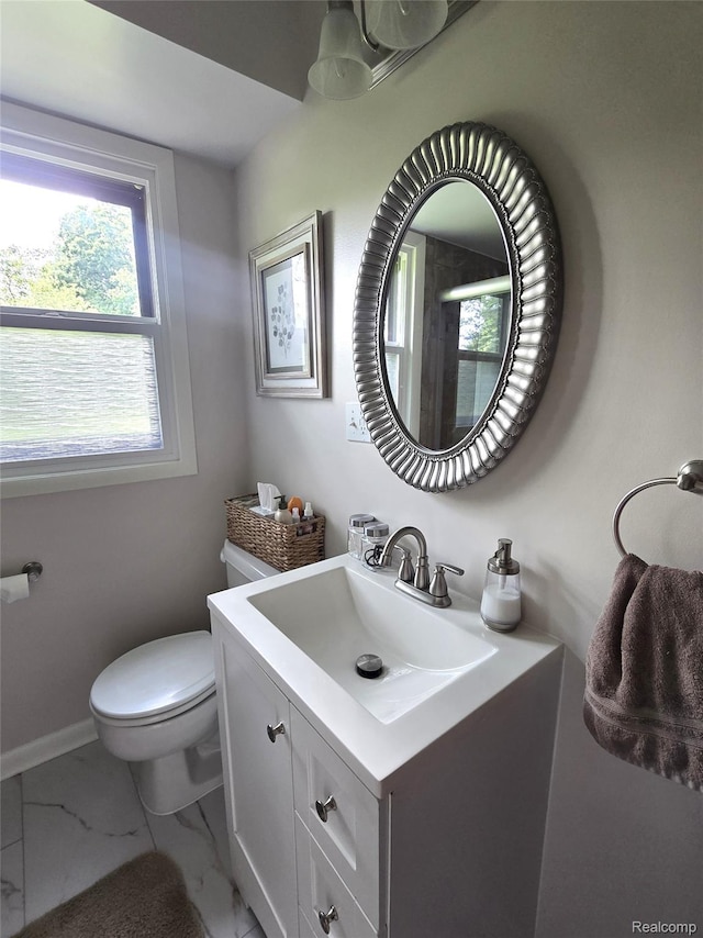 11019 Washington Ave, Mount Morris, MI 48458 - bathroom featuring vanity and marble look tile flooring