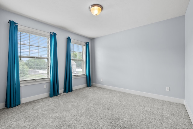5661 Attleberry Ave, Kalamazoo, MI 49009 - carpeted spare room featuring baseboards