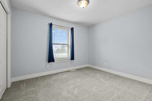 5661 Attleberry Ave, Kalamazoo, MI 49009 - unfurnished bedroom with a closet and carpet