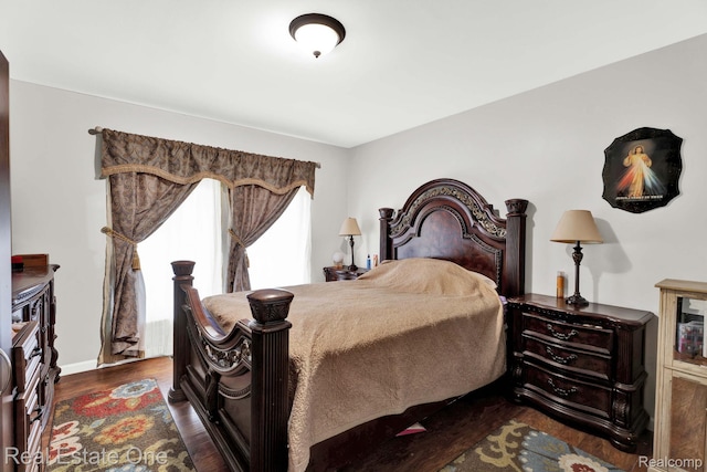 2308 Kipling Dr, Sterling Heights, MI 48310 - bedroom with dark wood-type flooring and baseboards