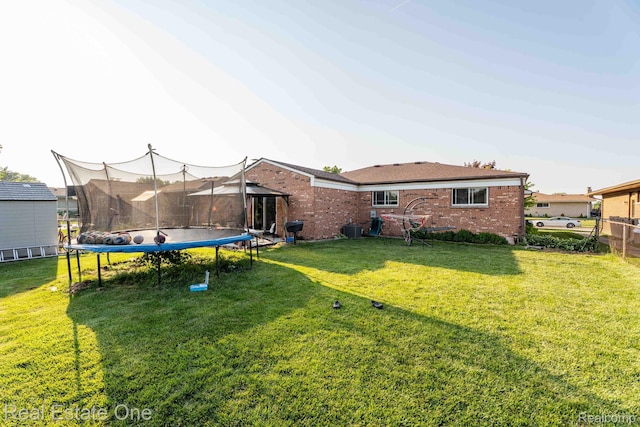 2308 Kipling Dr, Sterling Heights, MI 48310 - view of yard with a trampoline