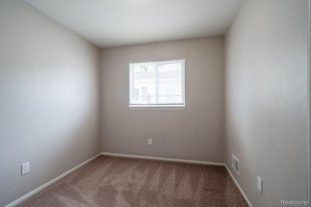20327 Ellis St, Roseville, MI 48066 - empty room featuring carpet floors and baseboards