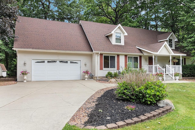 3349 Shimmons Rd, Auburn Hills, MI 48326 - new england style home featuring a porch, concrete driveway, an attached garage, a shingled roof, and a front lawn