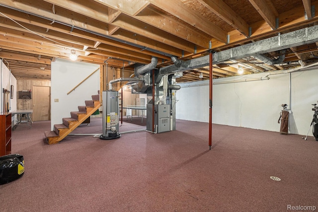 3349 Shimmons Rd, Auburn Hills, MI 48326 - unfinished below grade area with water heater, stairway, and heating unit