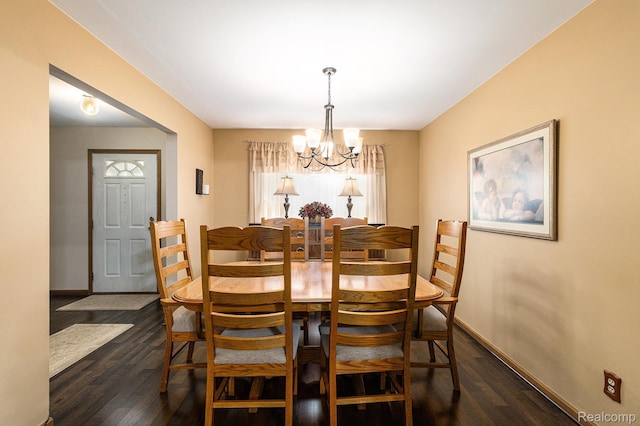 3349 Shimmons Rd, Auburn Hills, MI 48326 - dining room featuring a chandelier and dark wood-style flooring