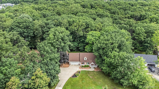 3349 Shimmons Rd, Auburn Hills, MI 48326 - aerial view of property and surrounding area with a forest