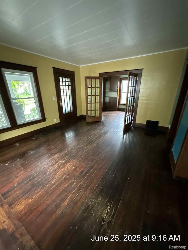 1431 Durand St, Flint, MI 48503 - foyer entrance featuring dark wood finished floors and french doors