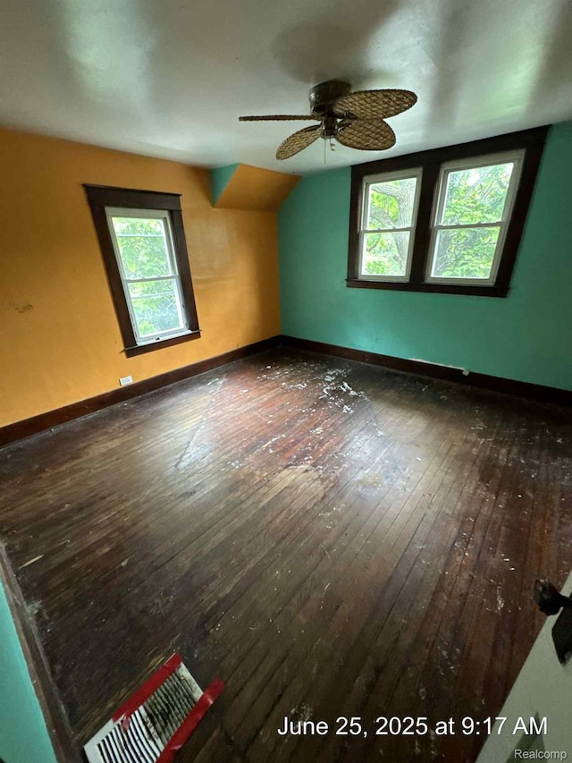 1431 Durand St, Flint, MI 48503 - unfurnished room with wood-type flooring, a ceiling fan, and vaulted ceiling