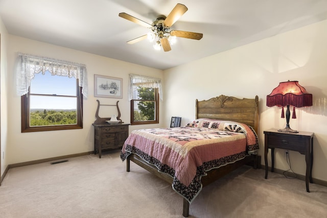 11713 Linderman Rd, Bear Lake, MI 49614 - bedroom featuring light colored carpet and ceiling fan