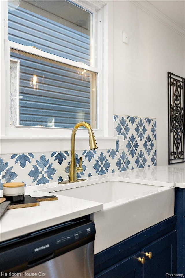 16514 Wildemere St, Detroit, MI 48221 - detailed view of dishwasher, blue cabinets, crown molding, light countertops, and wallpapered walls