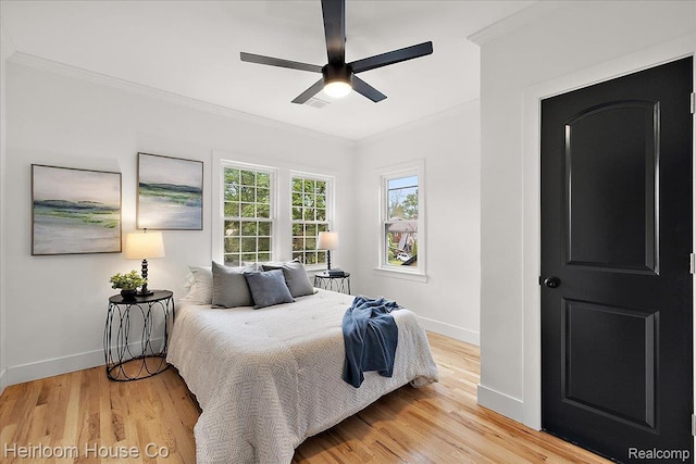 16514 Wildemere St, Detroit, MI 48221 - bedroom featuring crown molding, light wood finished floors, and a ceiling fan