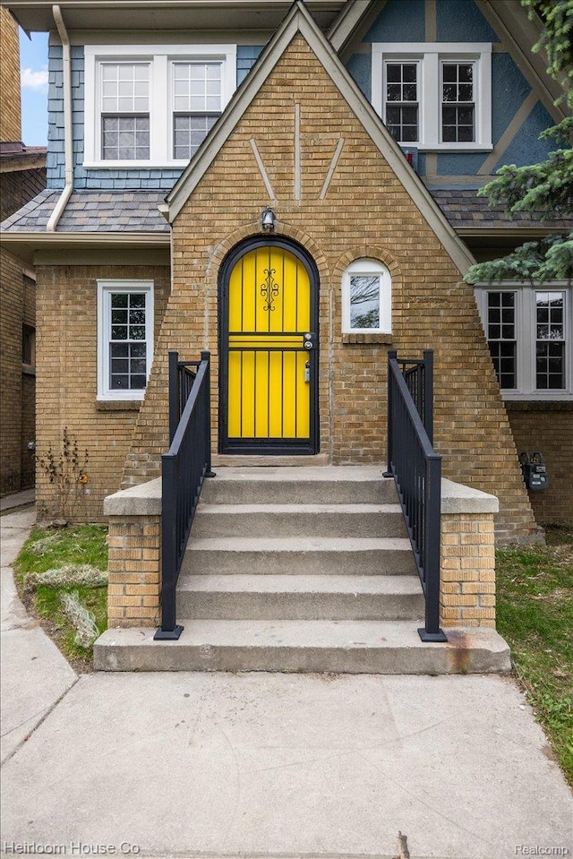 16514 Wildemere St, Detroit, MI 48221 - doorway to property featuring brick siding and a high end roof