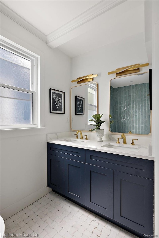 16514 Wildemere St, Detroit, MI 48221 - bathroom with double vanity, tile patterned floors, and ornamental molding