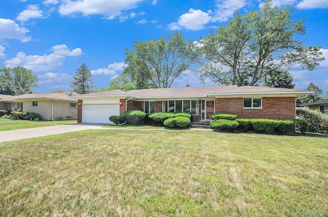 18319 Greenwald Dr, Southfield, MI 48075 - ranch-style house featuring brick siding, a garage, driveway, and a front yard
