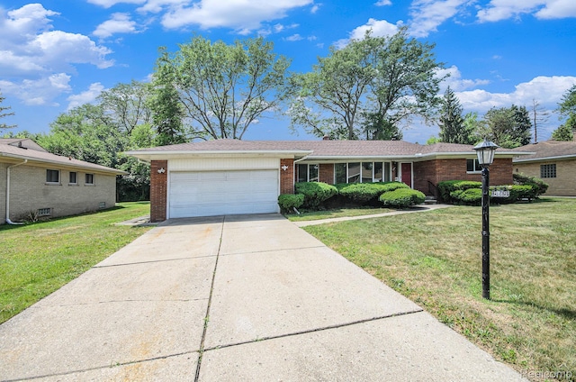 18319 Greenwald Dr, Southfield, MI 48075 - ranch-style home with brick siding, a garage, driveway, and a front yard
