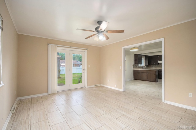 18319 Greenwald Dr, Southfield, MI 48075 - unfurnished room featuring ceiling fan, ornamental molding, and french doors