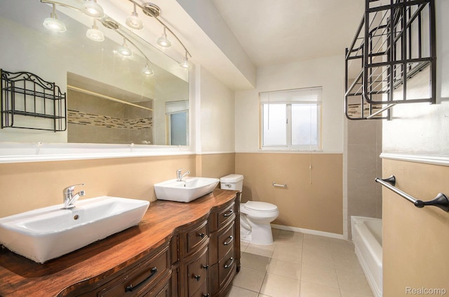 18319 Greenwald Dr, Southfield, MI 48075 - bathroom featuring tile patterned floors, double vanity, and bathtub / shower combination